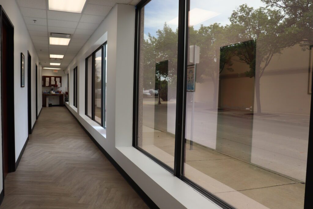 Specialty Urgent Care 3 a hallway with large windows